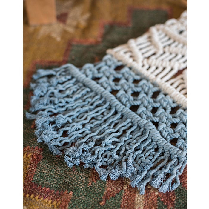 Handmade blue knotted wall tapestry featuring cotton rope and wooden stick, perfect for home decor.