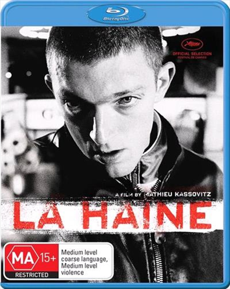 La Haine Blu-ray cover featuring three young men in a dramatic urban setting, highlighting themes of youth and social unrest.