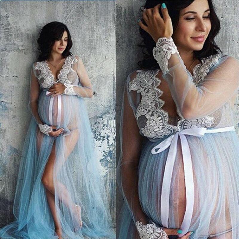 A beautiful pregnant woman wearing a Lace V-Neck Hollow Out Maternity Dress, showcasing its elegant design and flowing silhouette.