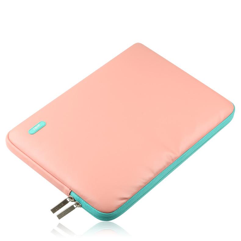 Stylish laptop sleeve for 11.6-12 inch MacBook Air and Pro, made of imitation leather with zipper closure.