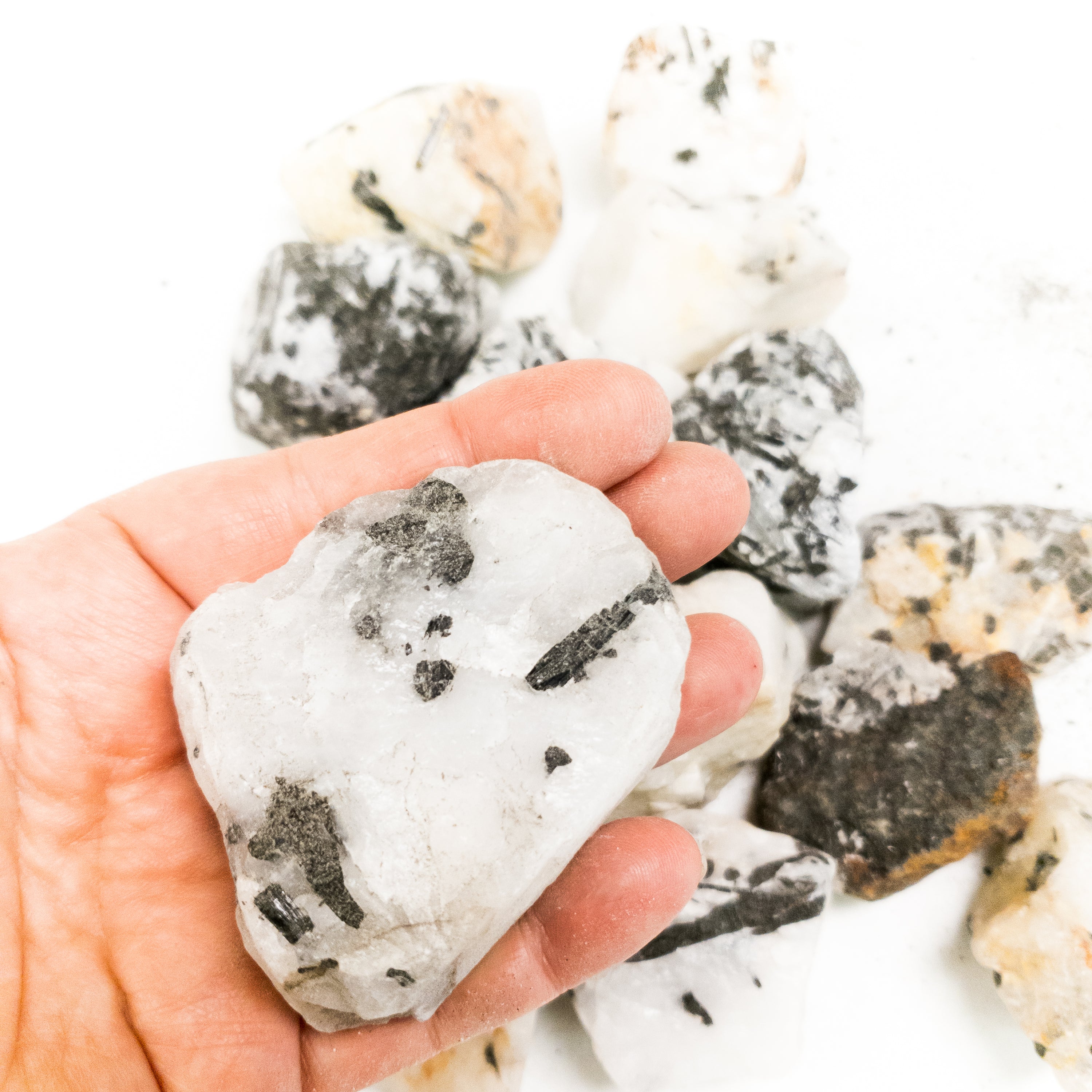 Large 3-4 inch rough Tourmalinated Quartz stone with black Tourmaline inclusions, showcasing its natural beauty and unique texture.