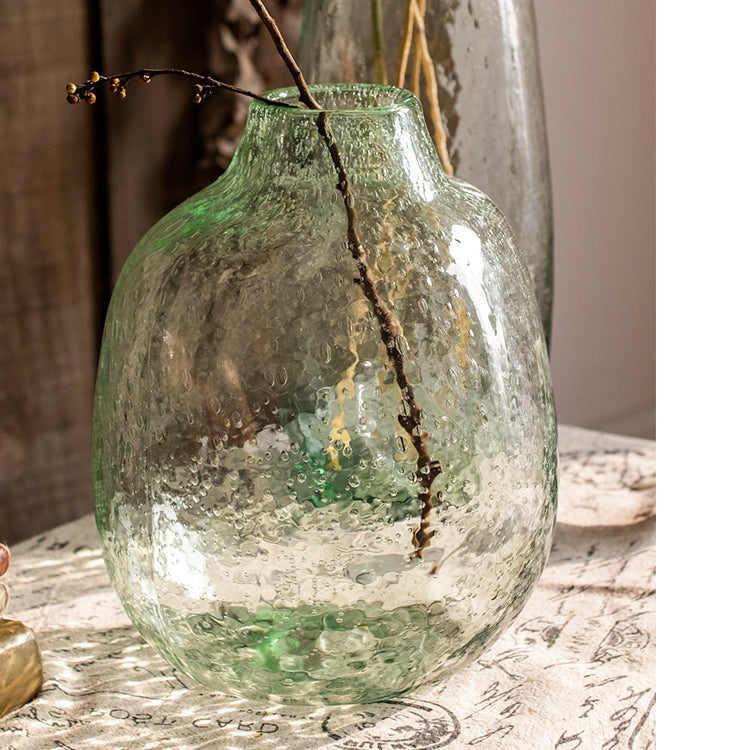 Large Artisan Glass Irregular Shape Vase in clear and green colors, showcasing its unique hand-blown design and elegant curves.