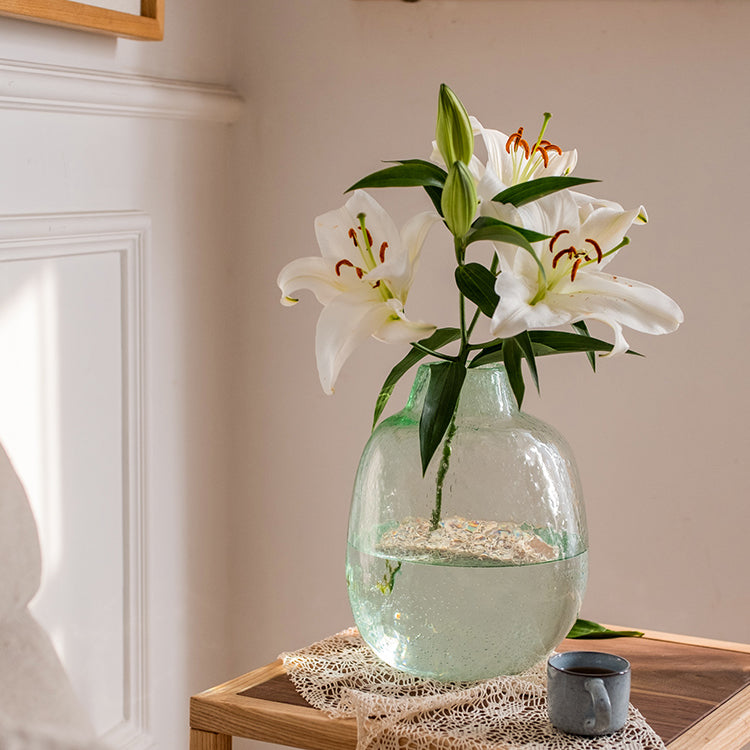 Large Artisan Glass Irregular Shape Vase in clear and green colors, showcasing its unique hand-blown design and elegant curves.