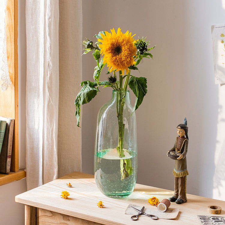 Large Artisan Glass Irregular Shape Vase in clear and green colors, showcasing its unique hand-blown design and elegant curves.