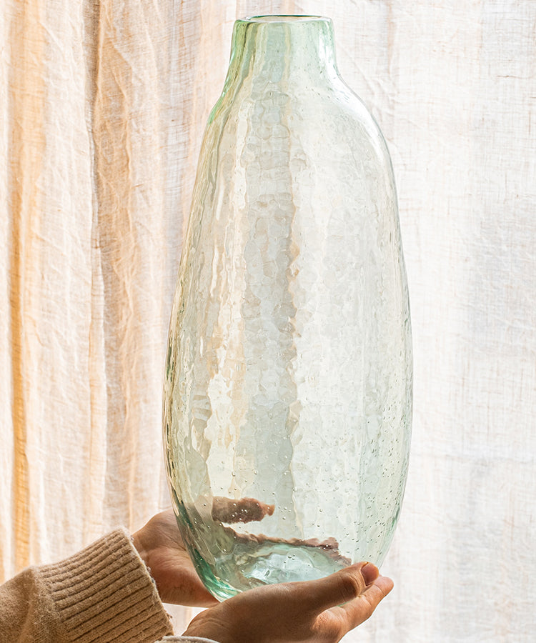 Large Artisan Glass Irregular Shape Vase in clear and green colors, showcasing its unique hand-blown design and elegant curves.