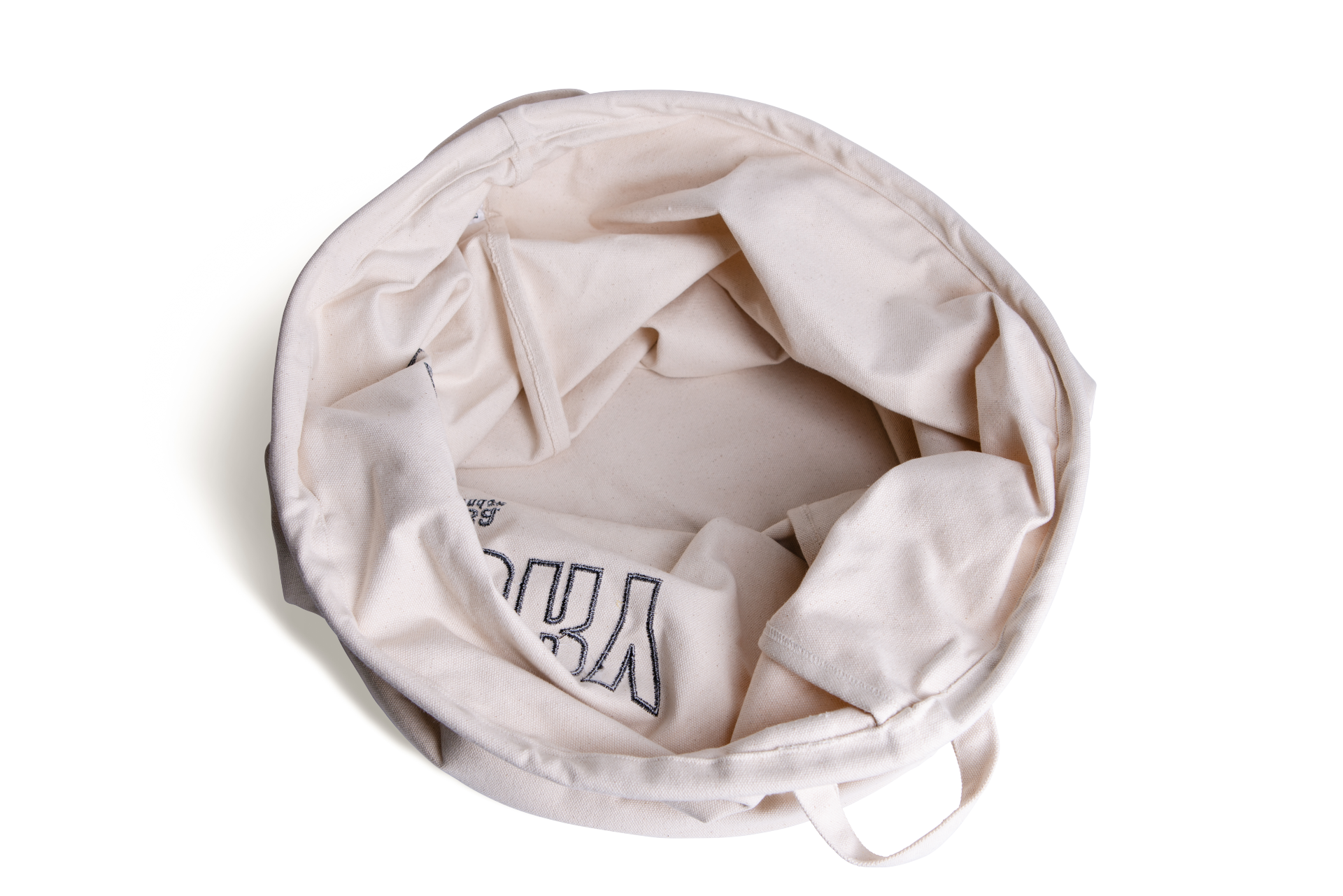 A spacious organic cotton laundry bag with a natural color, featuring a lightweight aluminum ring for stability, perfect for laundry and travel.