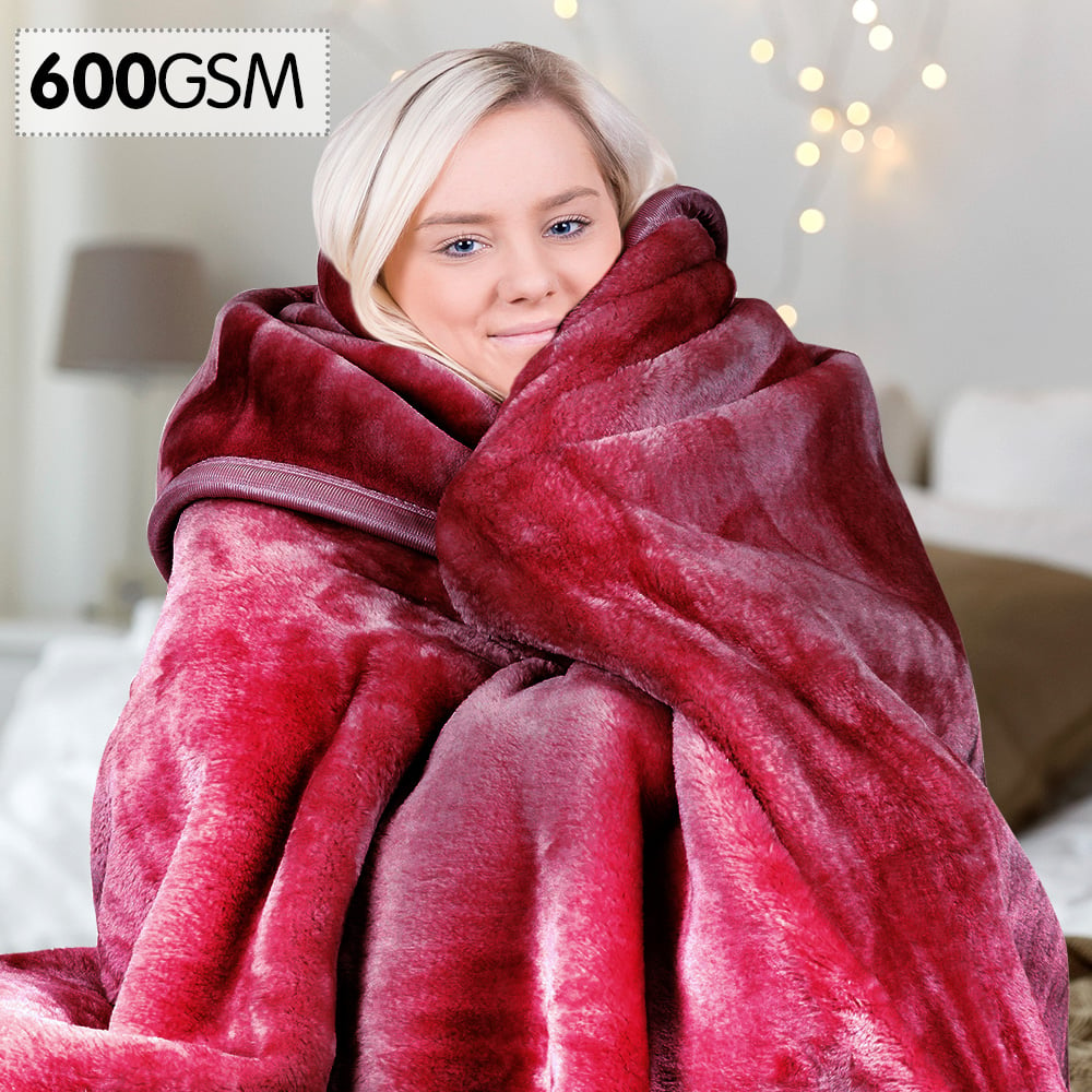 Laura Hill double-sided mink blanket in queen size, showcasing its soft plush texture and elegant silvery shine.