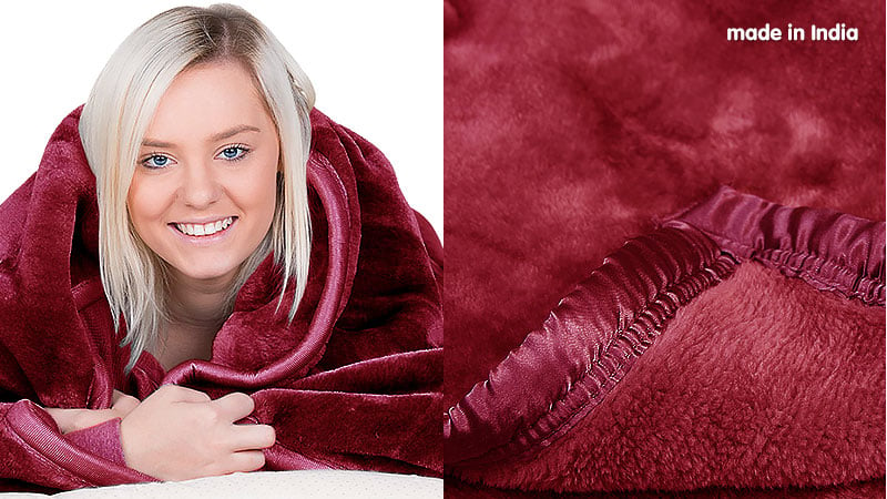 Laura Hill double-sided mink blanket in queen size, showcasing its soft plush texture and elegant silvery shine.