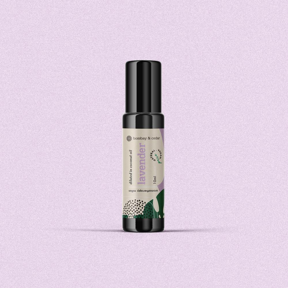 Lavender Essential Oil Roll-on in a biophotonic glass bottle with a glass roller ball, showcasing its elegant design and soothing lavender color.