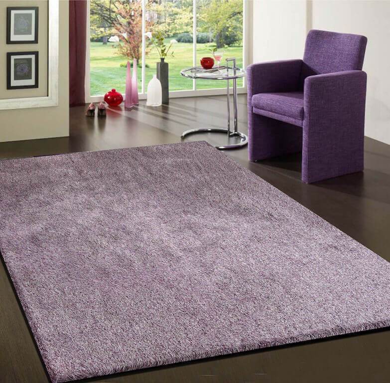 Lavender shag area rug from the Fancy Collection, featuring a plush high-pile texture and solid lavender color, perfect for home decor.