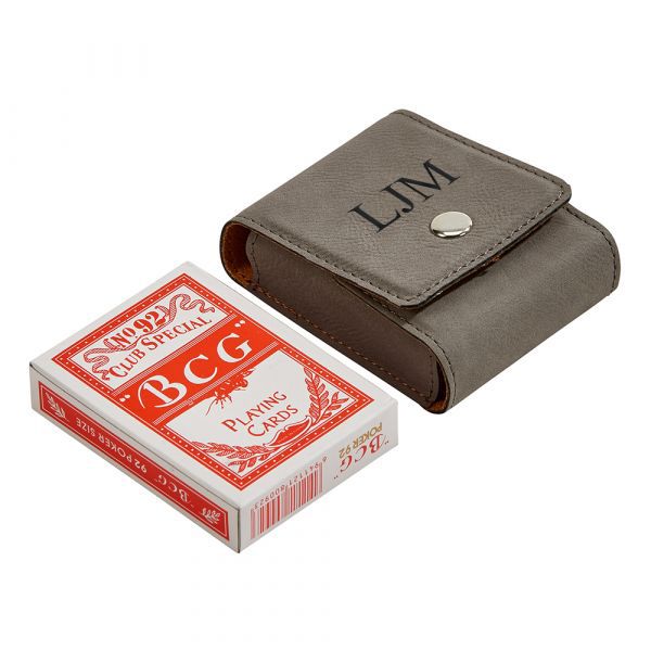 Grey leatherette playing cards case with snap closure, holding a deck of poker cards.