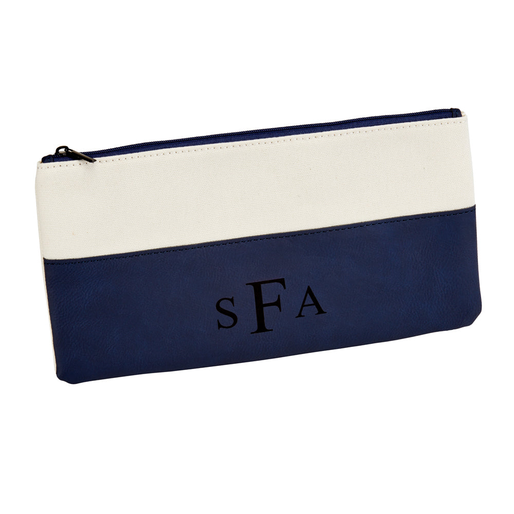 A stylish navy leatherette and canvas zippered pouch, perfect for cosmetics and travel essentials, featuring a sleek design and gift box.