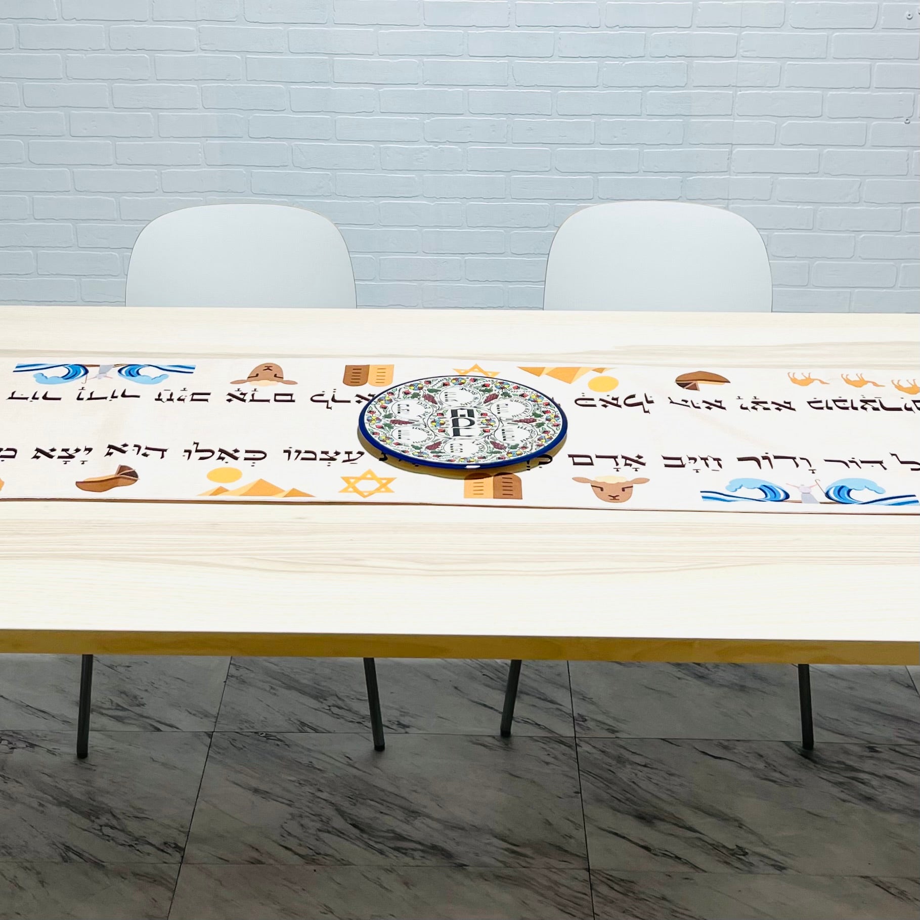 Leaving Egypt Passover Table Runner featuring Hebrew writing and icons, measuring 16 x 122 inches, made from linen cotton blend and soft satin.