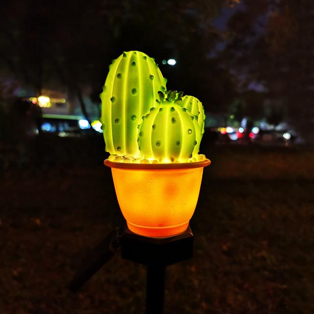 LED Solar Lamp designed in plant styles like pineapple and cactus, perfect for outdoor garden decoration.