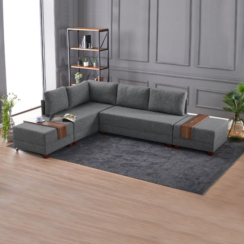 ANDRE Left Corner Sofa/Bed in Charcoal, featuring a modern design with removable trays and stools.