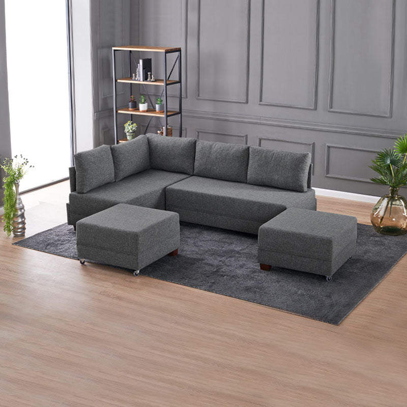 ANDRE Left Corner Sofa/Bed in Charcoal, featuring a modern design with removable trays and stools.