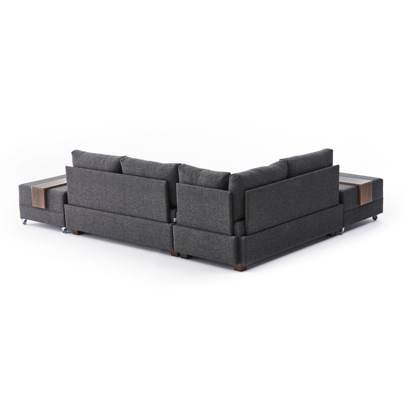 ANDRE Left Corner Sofa/Bed in Charcoal, featuring a modern design with removable trays and stools.