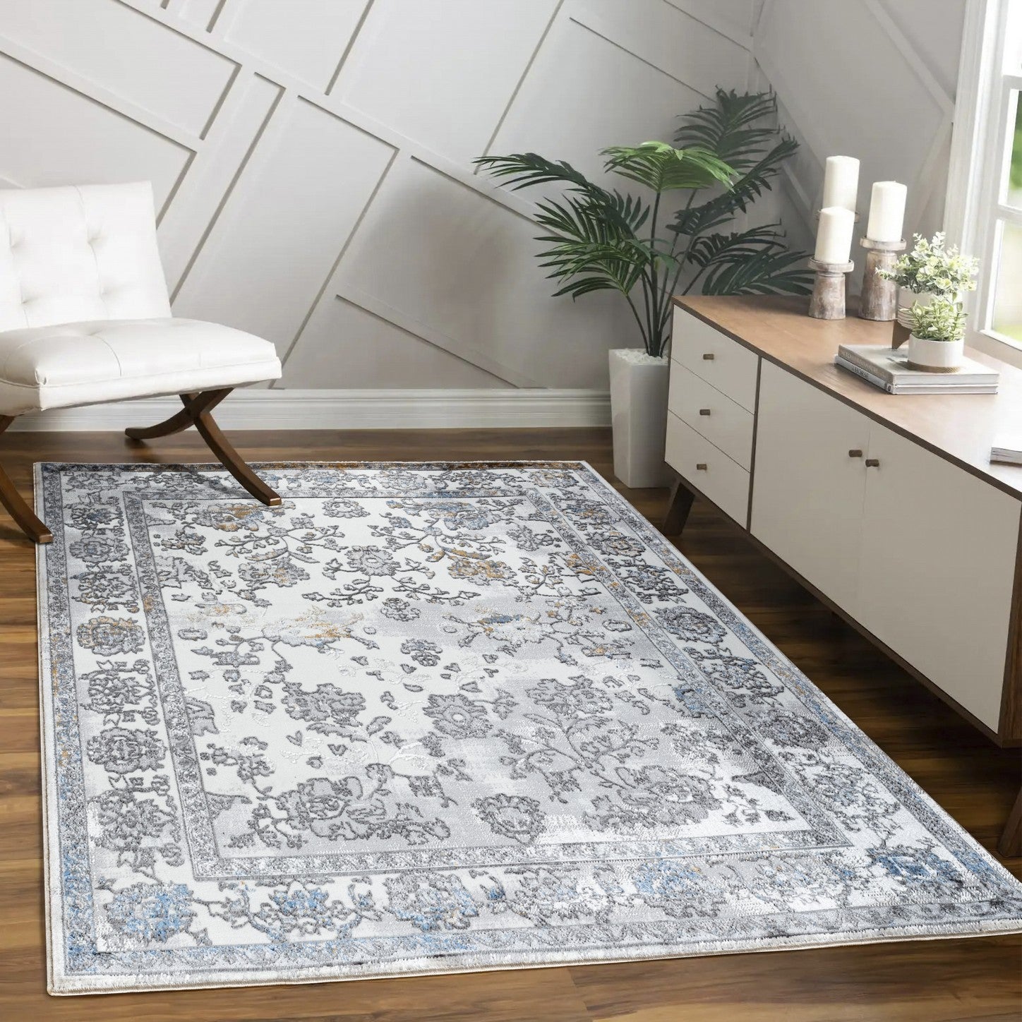 Legacy Multi 5 ft. 3 in. x 7 ft. Area Rug in grey, showcasing its soft texture and elegant design, perfect for enhancing home decor.