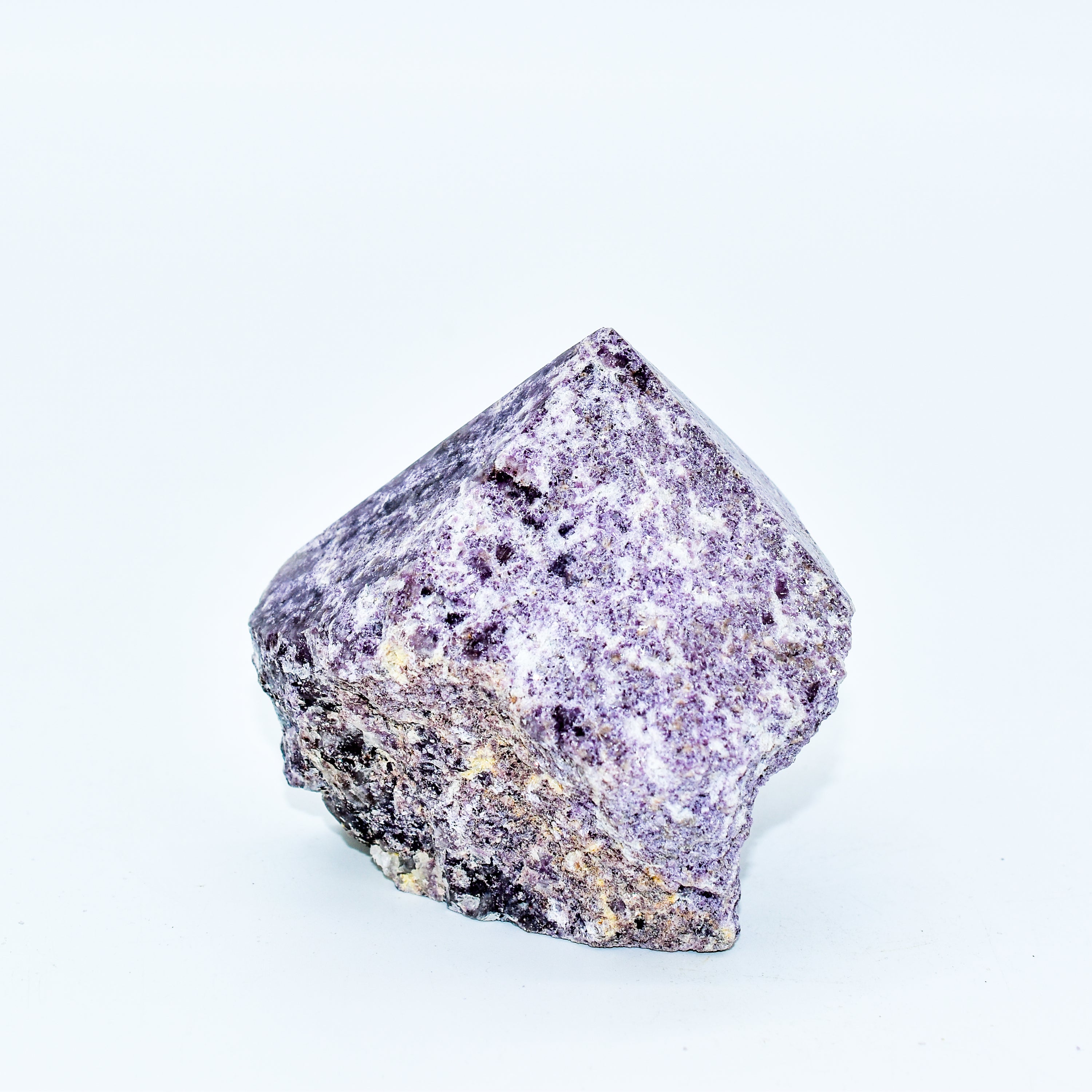 Lepidolite Power Points showcasing a partially polished top and rough bottom, measuring 3-4 inches tall, with a beautiful purple hue.