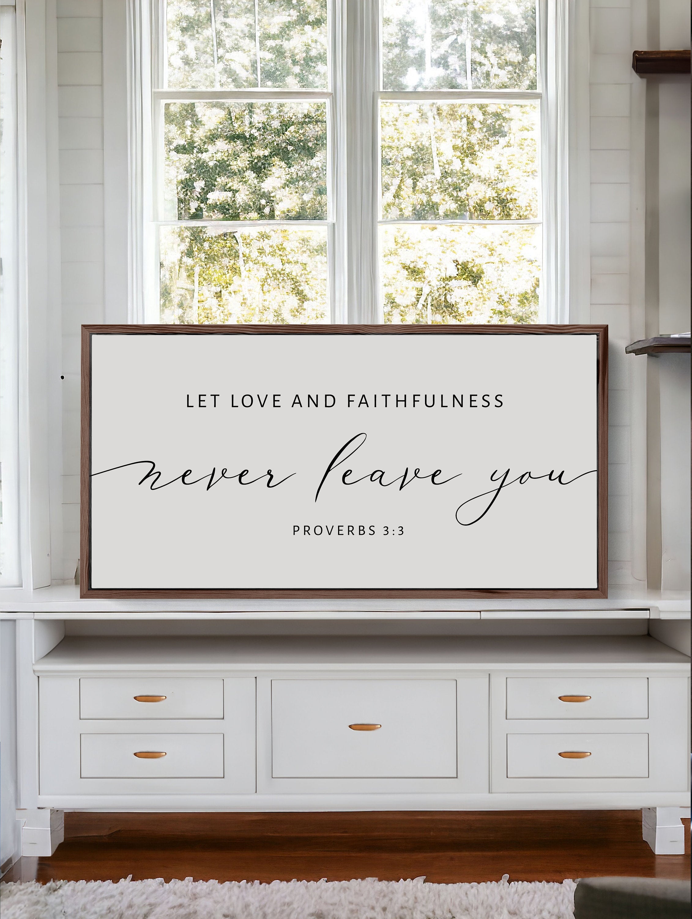 Handmade Christian wood sign with the phrase 'Let Love and Faithfulness Never Leave You', showcasing natural wood grain and customizable frame options.