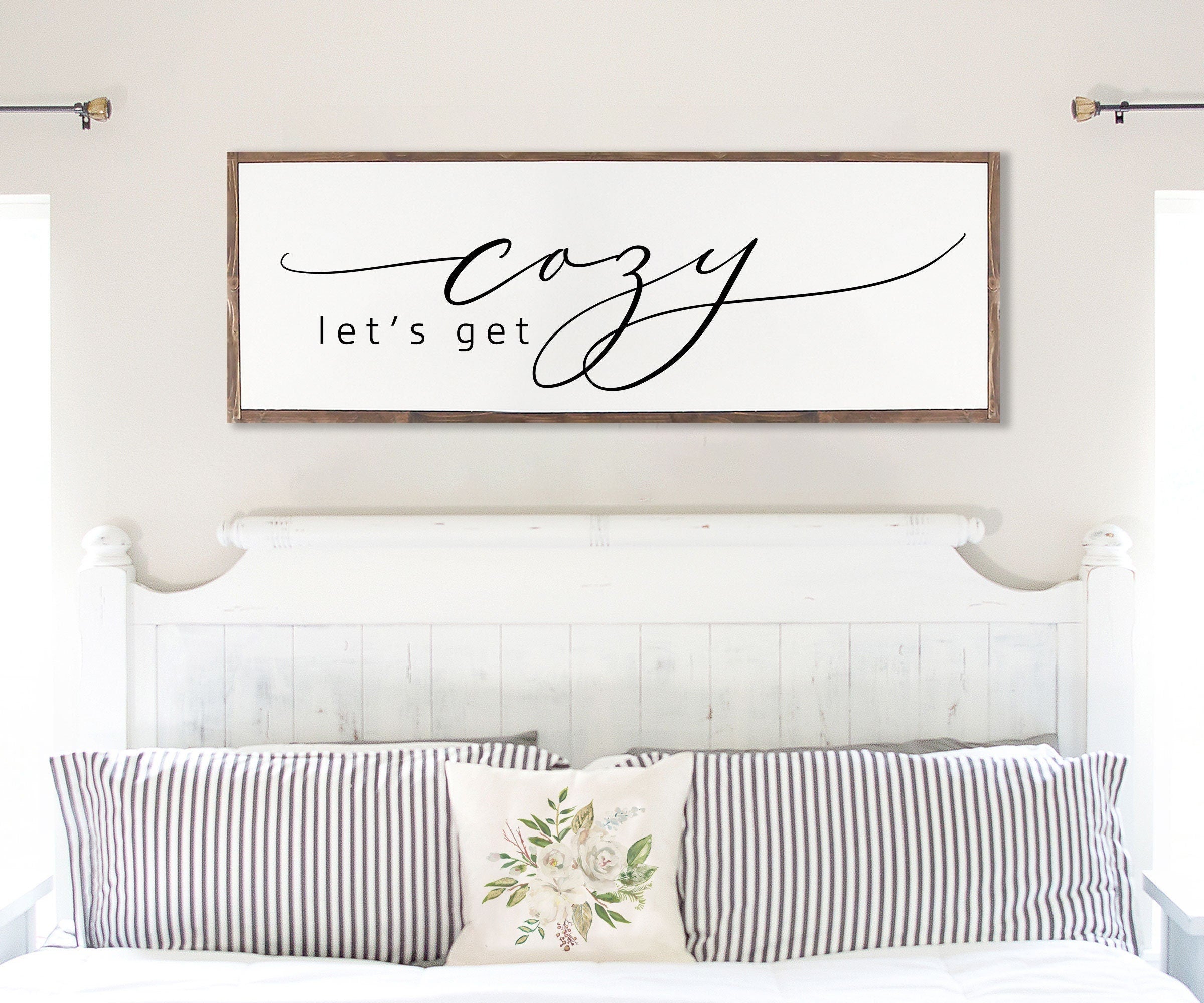 Rustic handmade wood sign featuring the phrase 'Let's Get Cozy', framed and stained in customizable colors, showcasing unique wood grain.