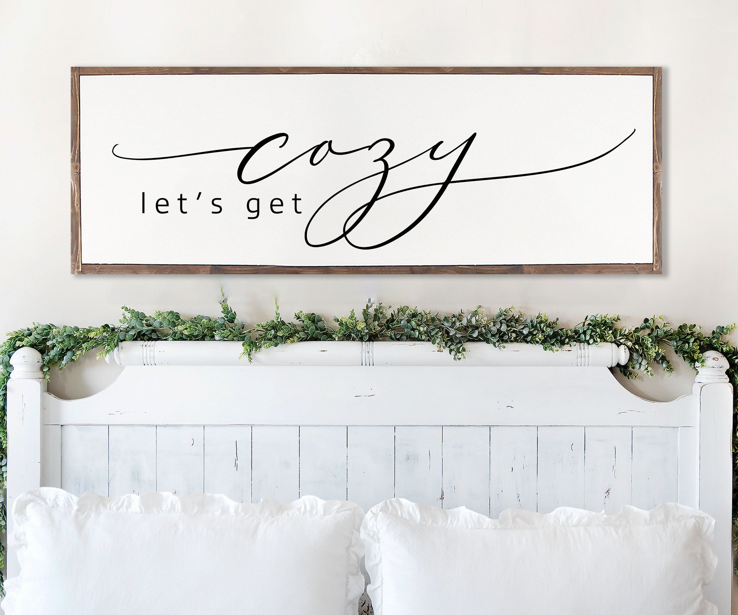 Rustic handmade wood sign featuring the phrase 'Let's Get Cozy', framed and stained in customizable colors, showcasing unique wood grain.