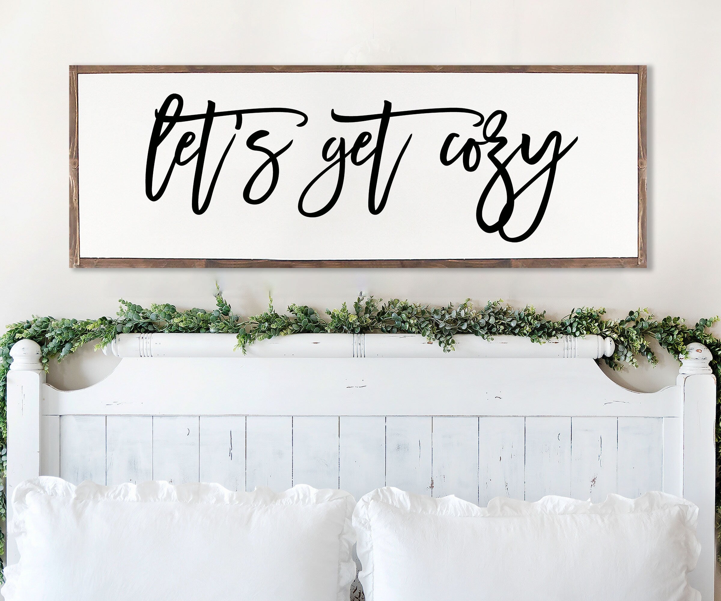 Rustic handmade wood sign with the phrase 'Let's Get Cozy', featuring unique wood grain and customizable frame options.