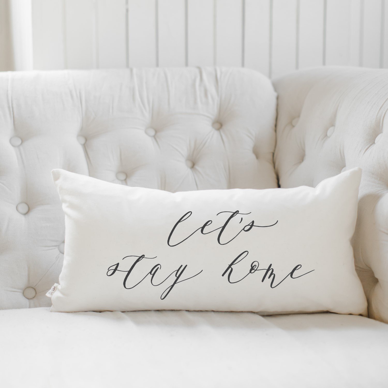 Let's Stay Home Lumbar Pillow featuring elegant calligraphy on a neutral background, perfect for farmhouse-style decor.