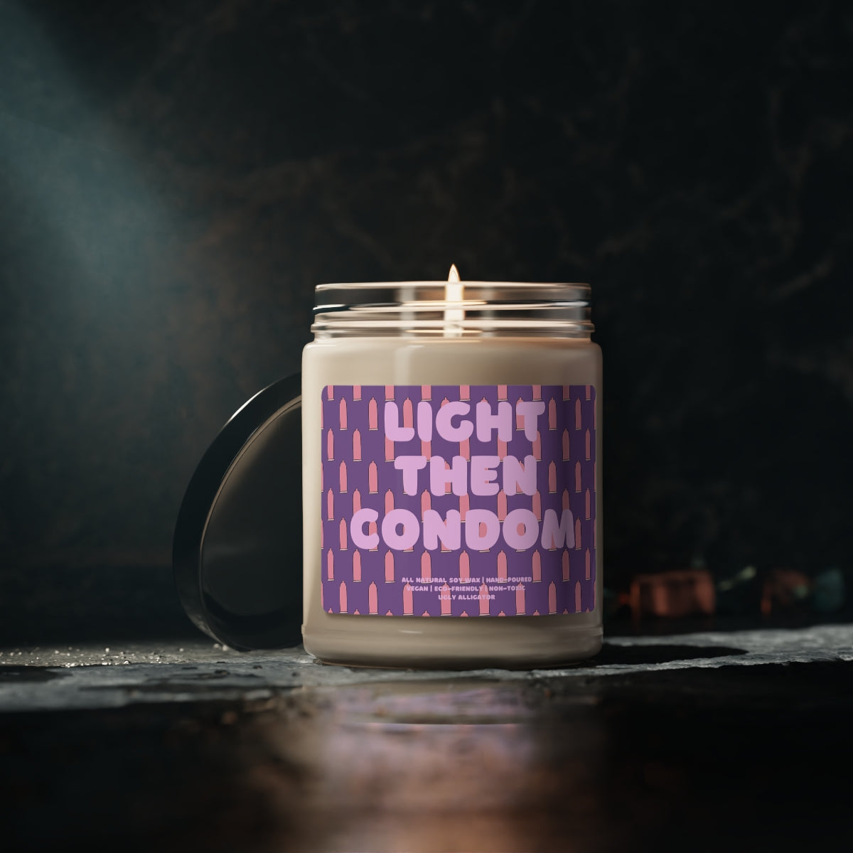 Light Then Condom Soy Candle in a 9oz glass jar, showcasing its stylish design and inviting aroma.