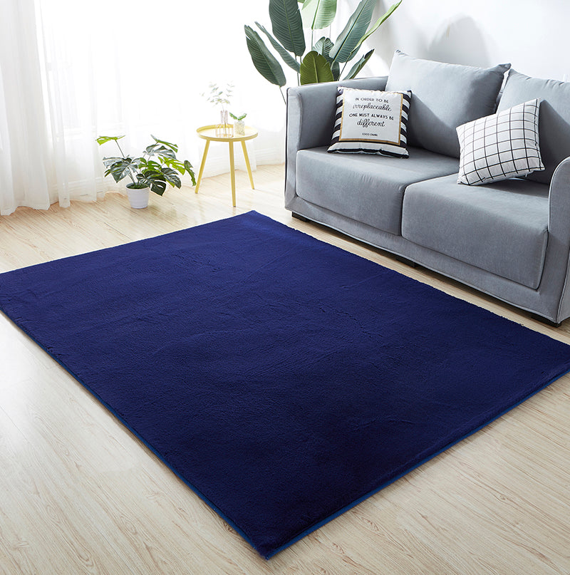 Lily Luxury Navy Blue Chinchilla Faux Fur Area Rug showcasing plush texture and rich color, perfect for contemporary decor.