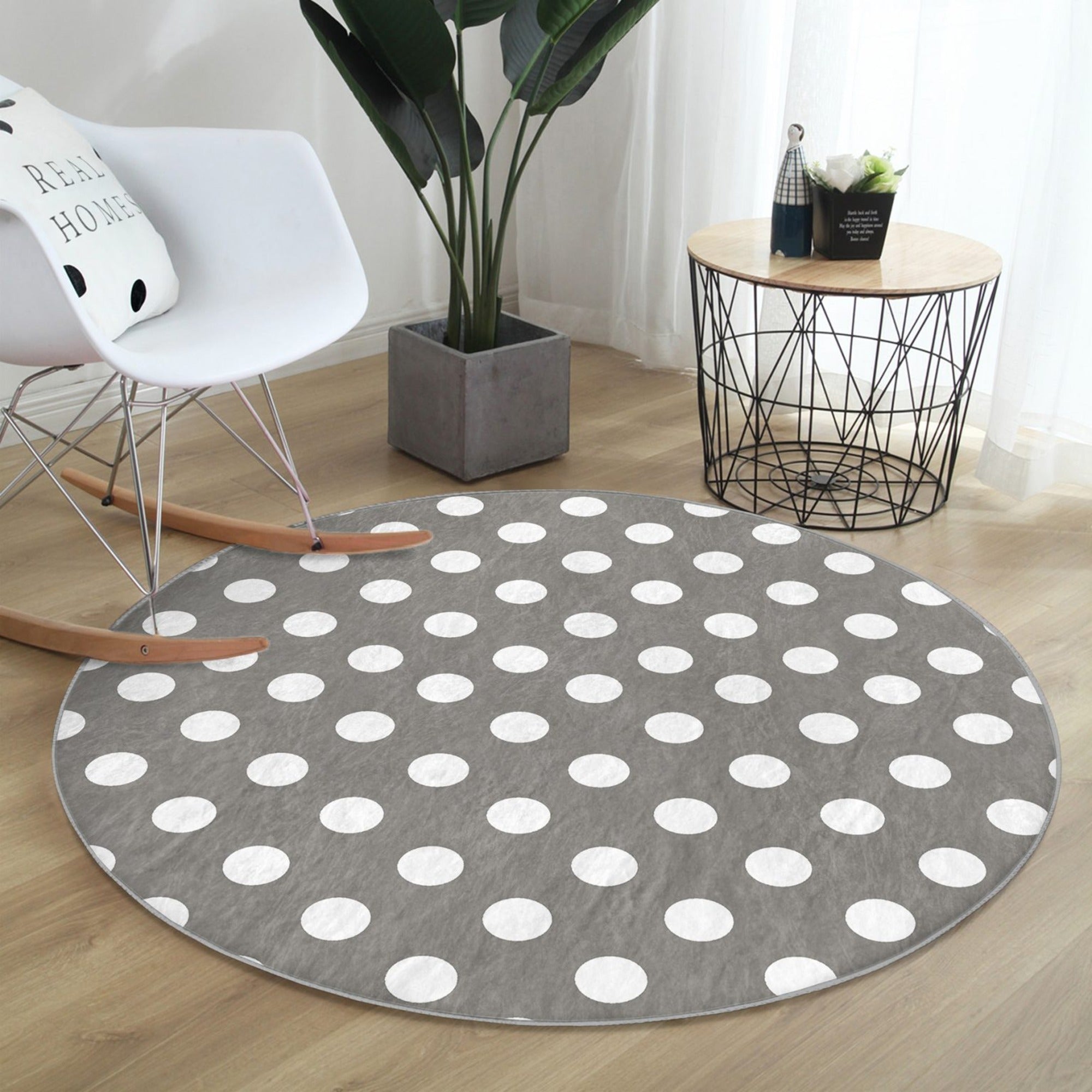 Stylish grey washable rug with soft velvet texture, perfect for living room decor.