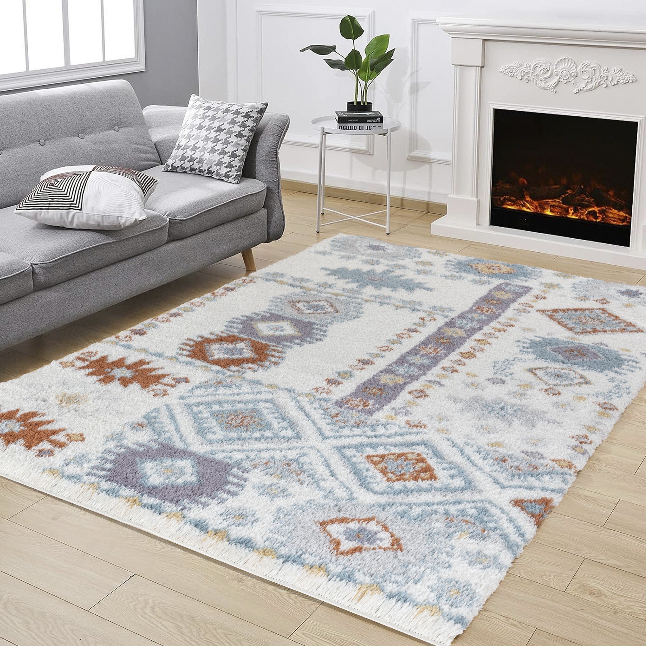 Loft Shag Ivory 5 ft. 3 in. x 7 ft. shaggy area rug with soft texture and elegant ivory color, perfect for home decor.