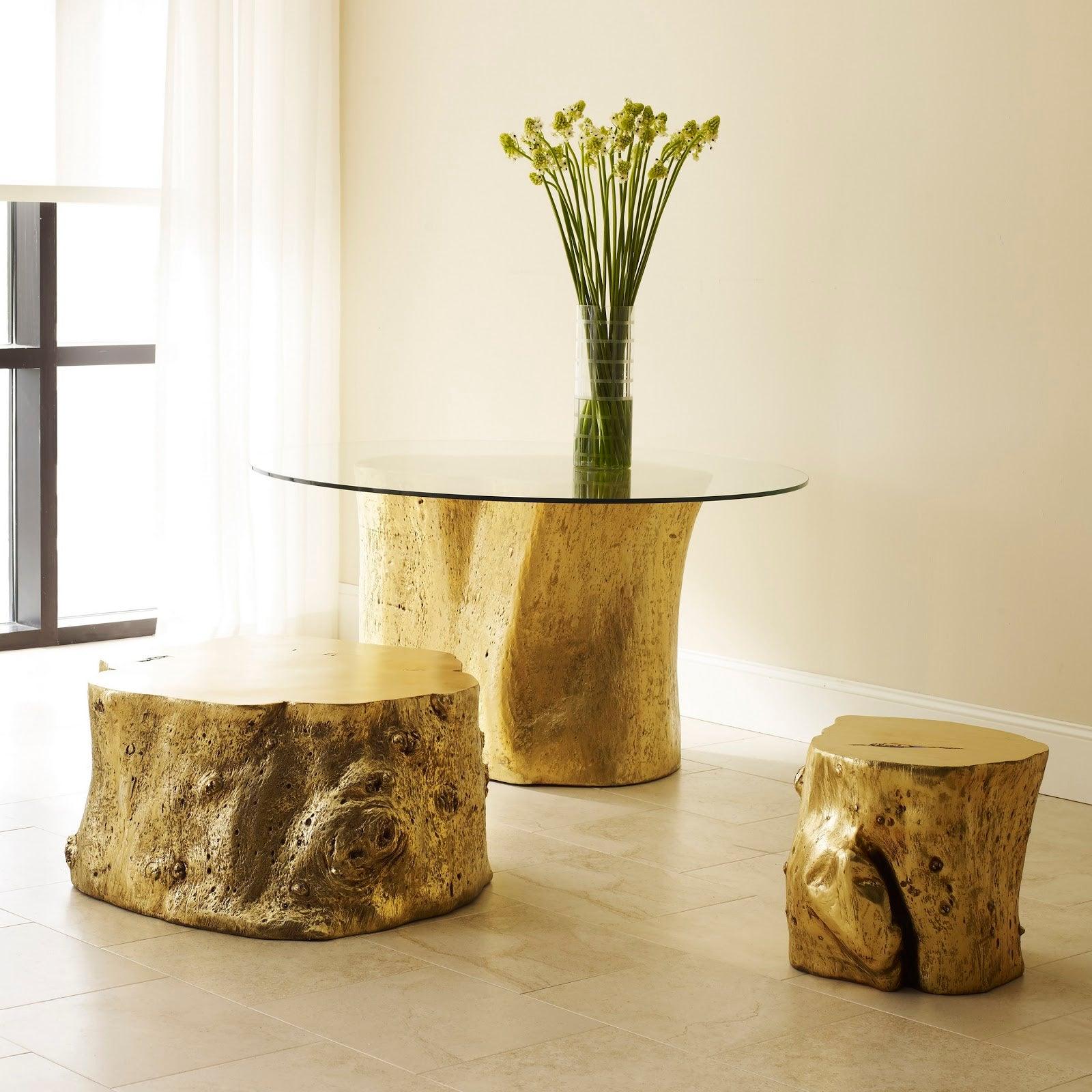 Log Small Gold Stool with a luminous gold leaf finish, resembling a natural log, perfect for modern interiors.