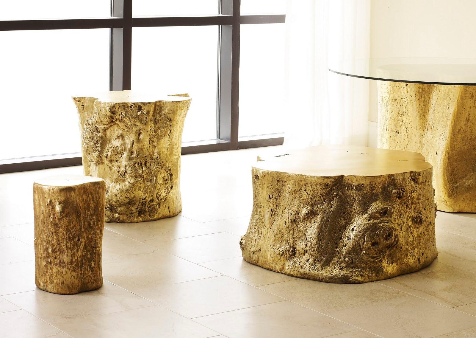 Log Small Gold Stool with a luminous gold leaf finish, resembling a natural log, perfect for modern interiors.