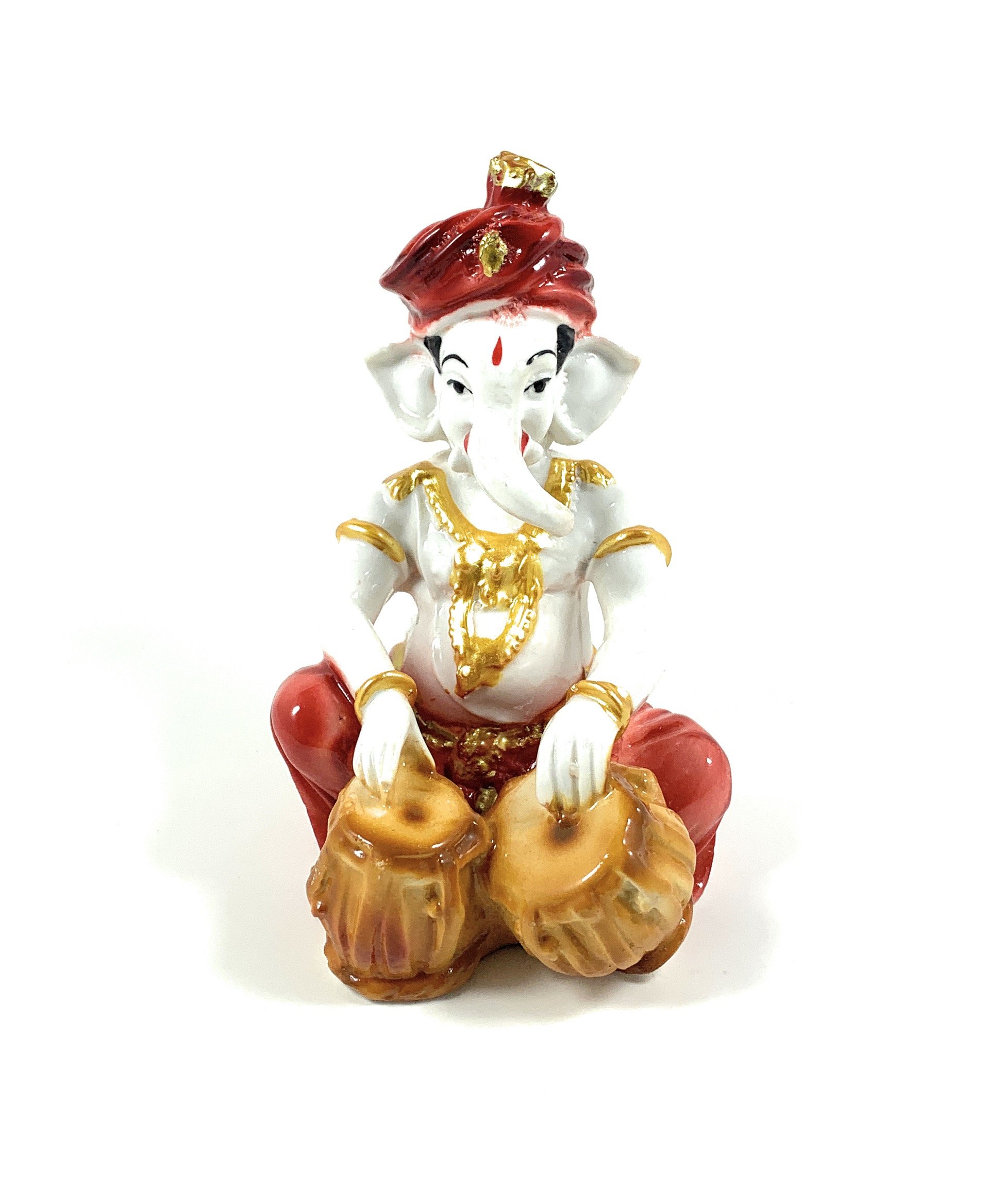 Handcrafted Lord Ganesha figurine playing Tabla, intricately designed and hand-painted, showcasing vibrant colors and fine details.