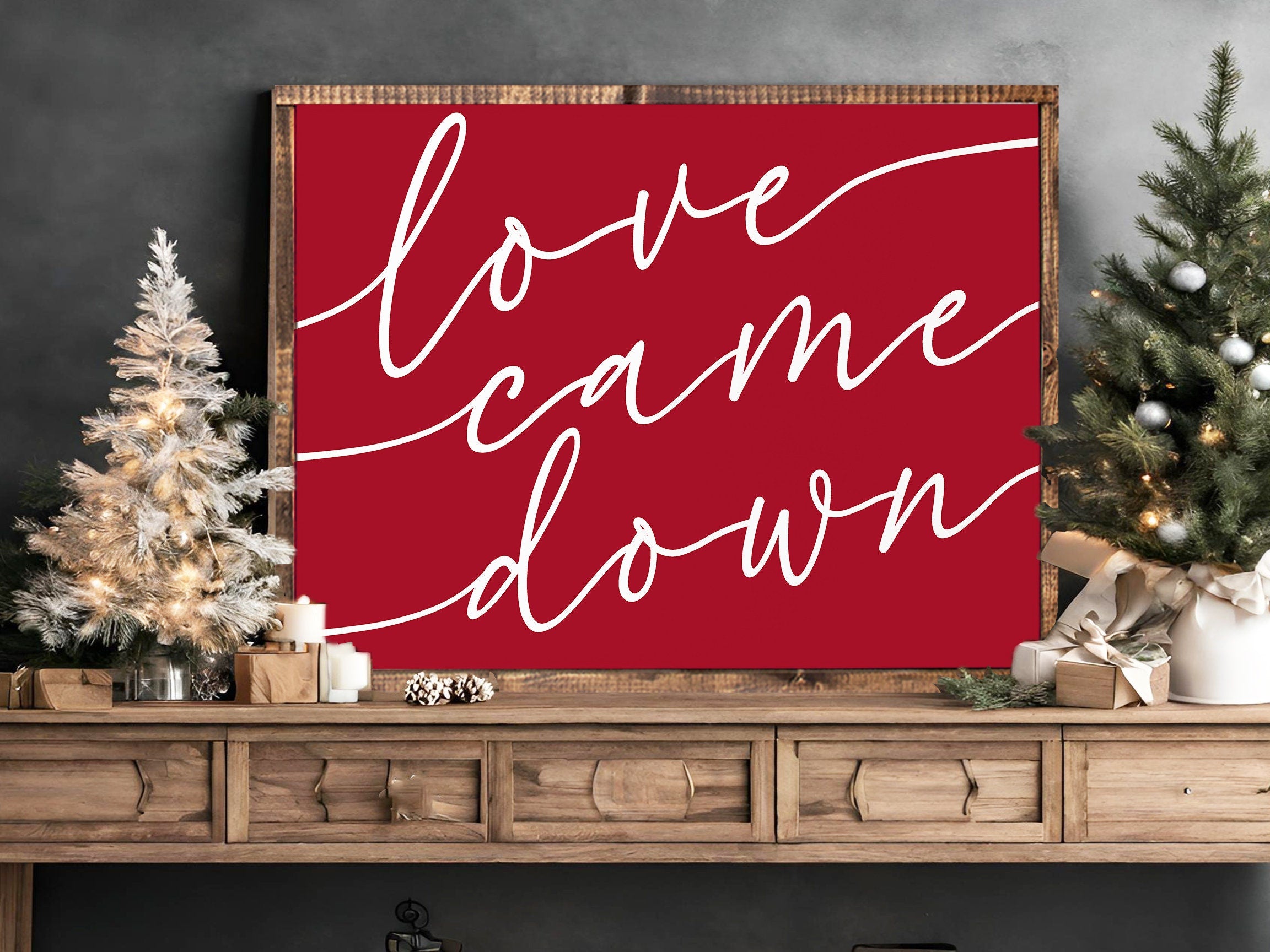 Handmade Love Came Down Christmas wall art sign, featuring rustic wood with unique grain and hand-painted lettering in rich walnut color.