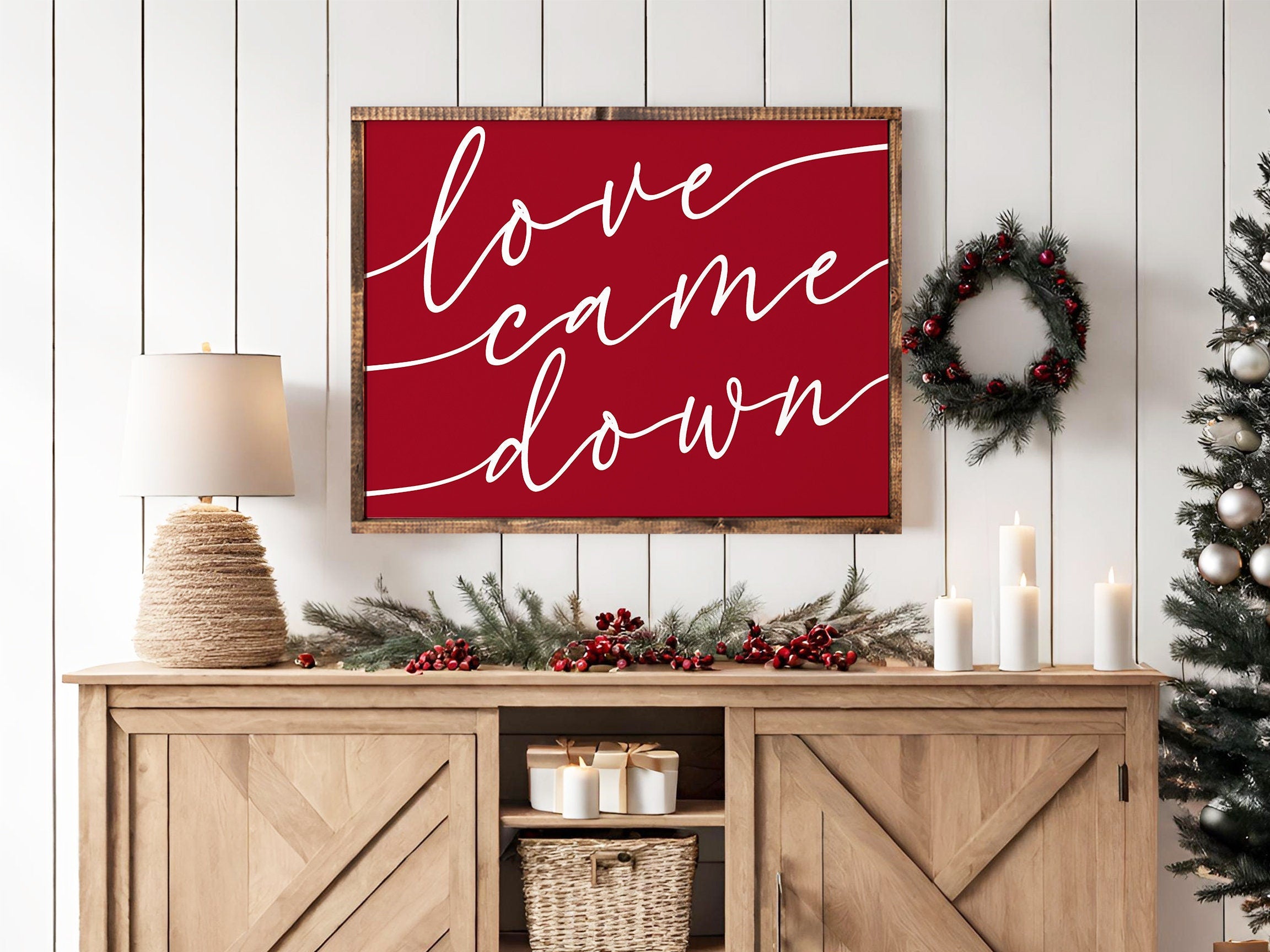 Handmade Love Came Down Christmas wall art sign, featuring rustic wood with unique grain and hand-painted lettering in rich walnut color.