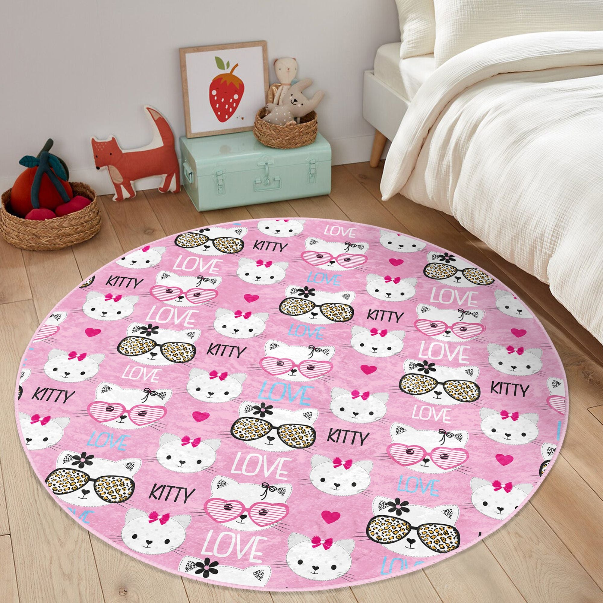 Lovely pink round rug featuring a playful kitty pattern, perfect for kids' rooms, made from soft velvet fabric.