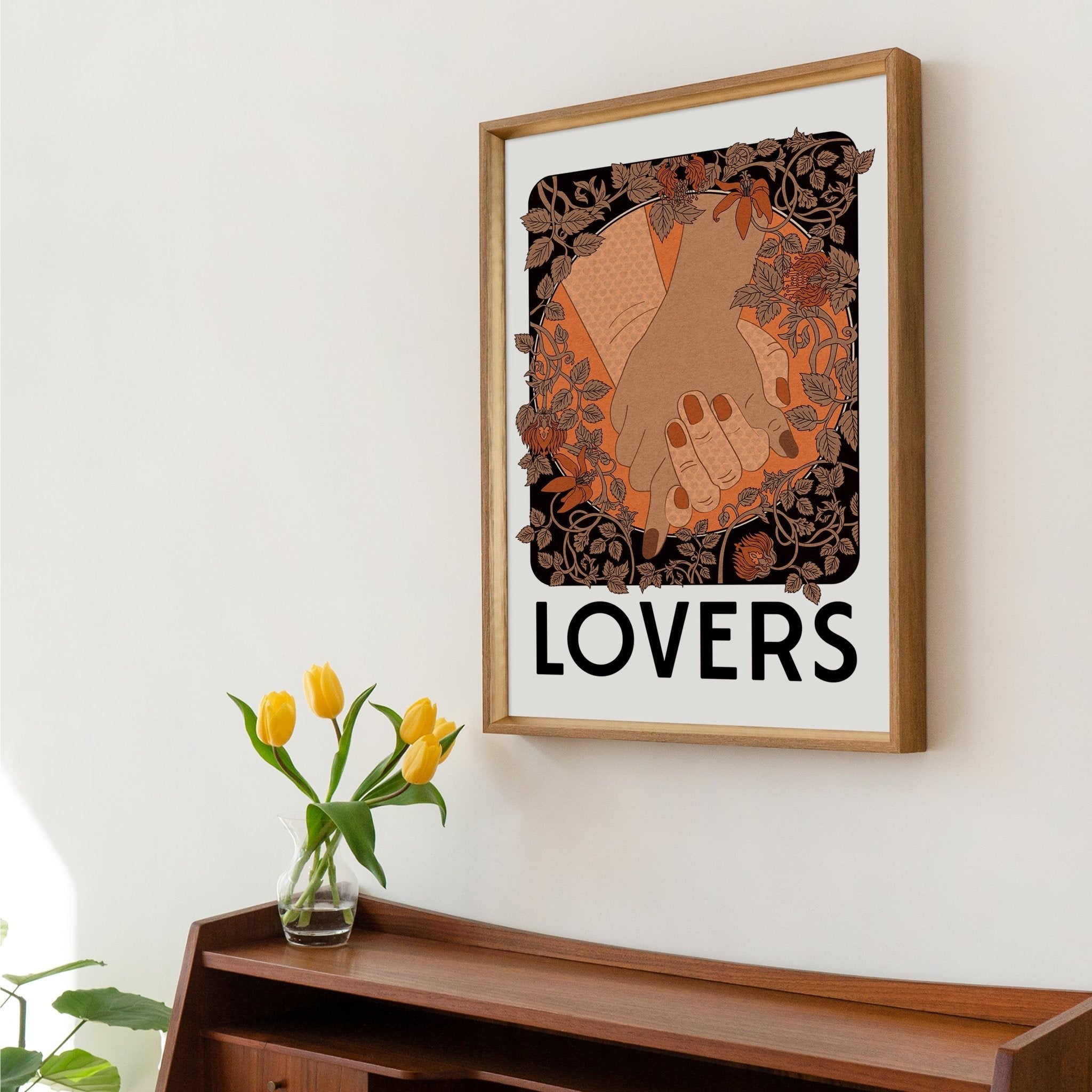 Lovers Art Print featuring clasped hands surrounded by floral Art Nouveau design, with 'LOVERS' text below.