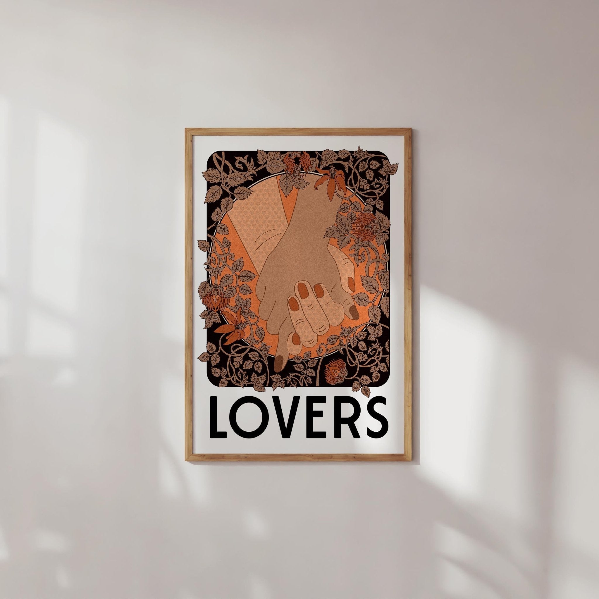 Lovers Art Print featuring clasped hands surrounded by floral Art Nouveau design, with 'LOVERS' text below.