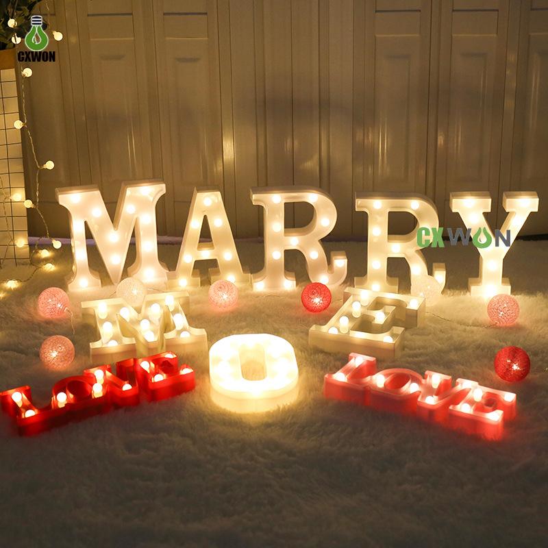 Luminous LED Letter Night Light displaying warm white light, perfect for weddings and parties, featuring various letters and numbers.