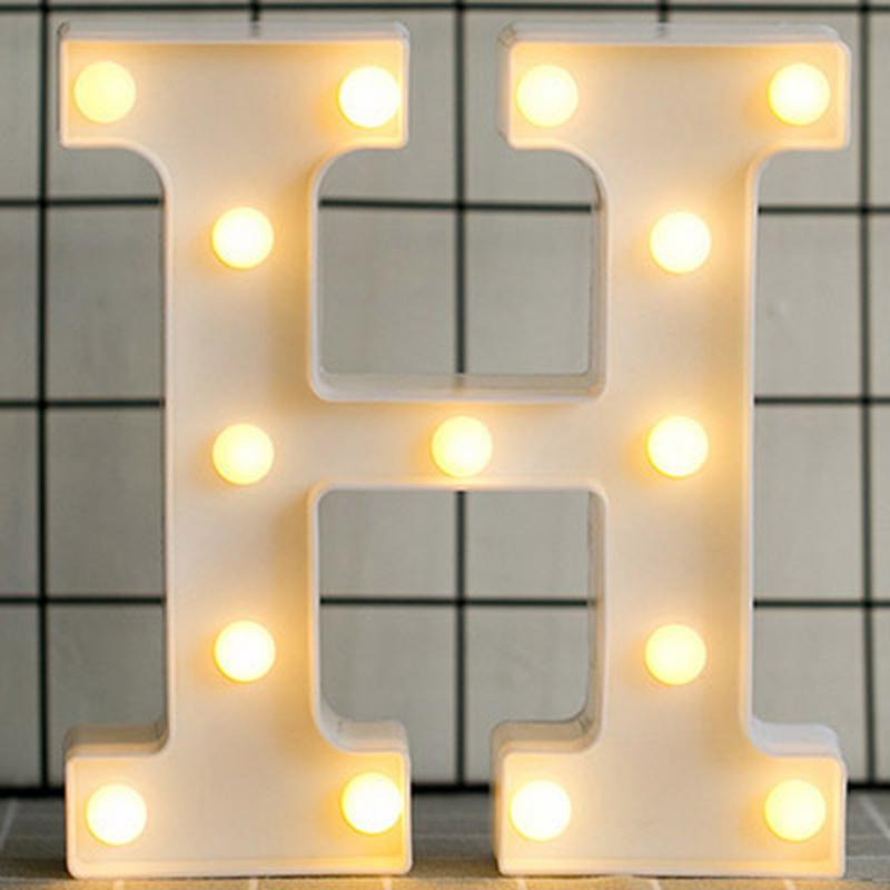 Luminous LED Letter Night Light displaying warm white light, perfect for weddings and parties, featuring various letters and numbers.