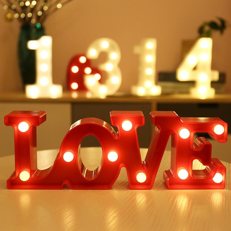 Luminous LED Letter Night Light displaying warm white light, perfect for weddings and parties, featuring various letters and numbers.