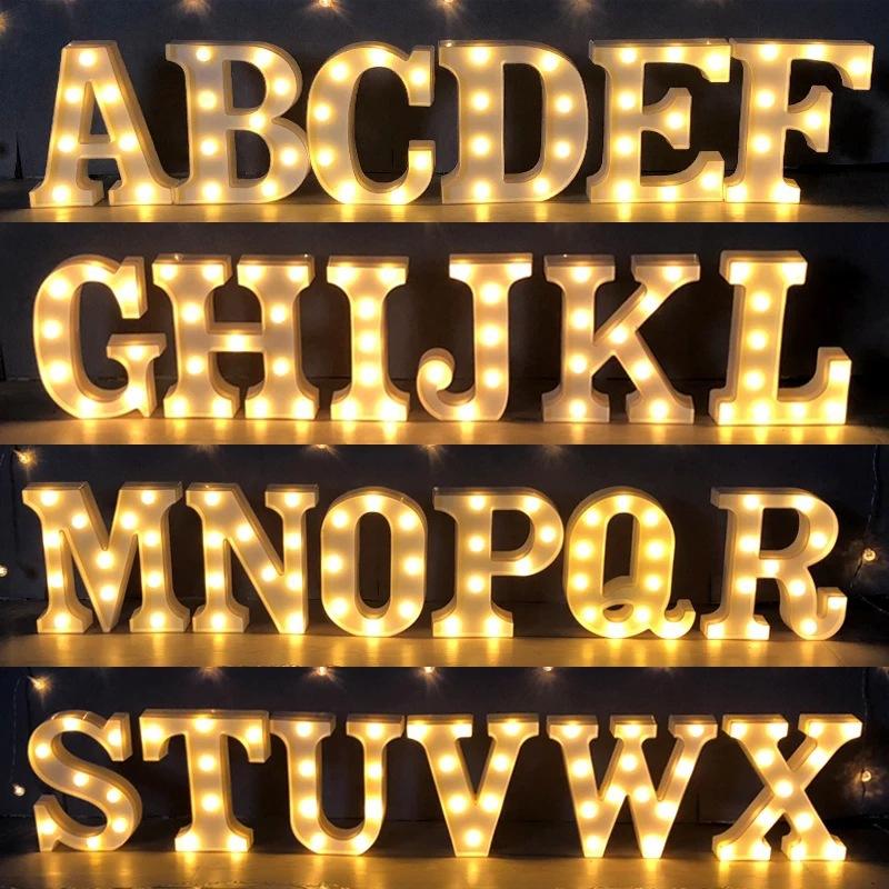 Luminous LED Letter Night Light displaying warm white light, perfect for weddings and parties, featuring various letters and numbers.