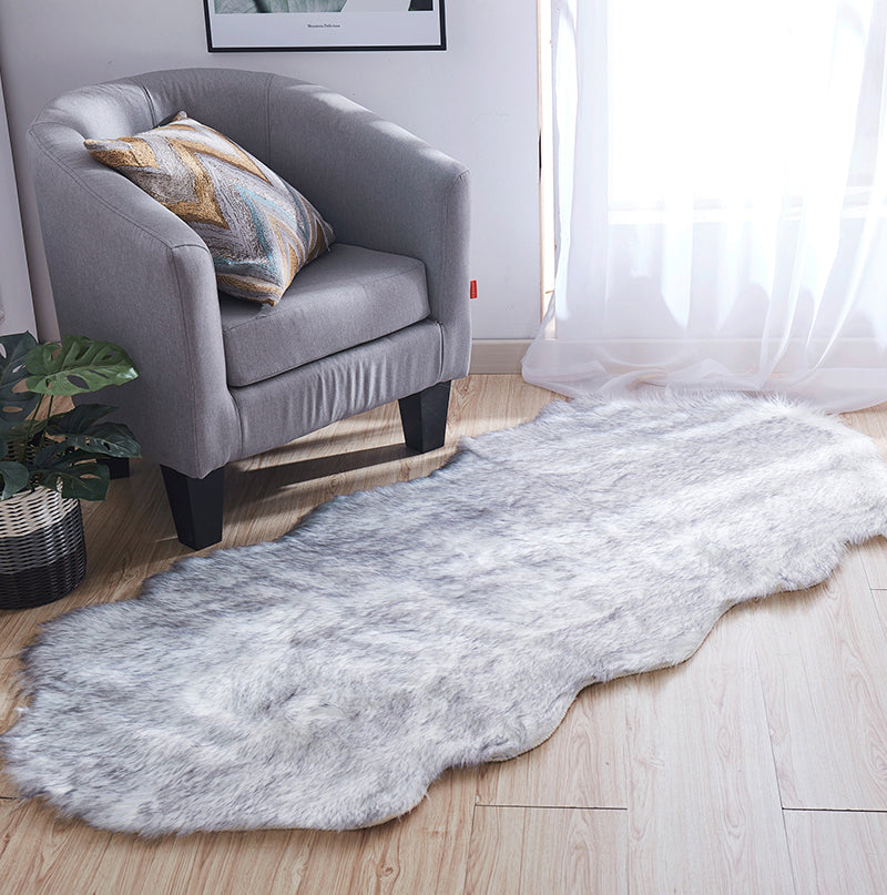 Luxury Dark Grey Faux Fur Decorative Rug measuring 32 inches by 71 inches, showcasing its plush texture and elegant design.