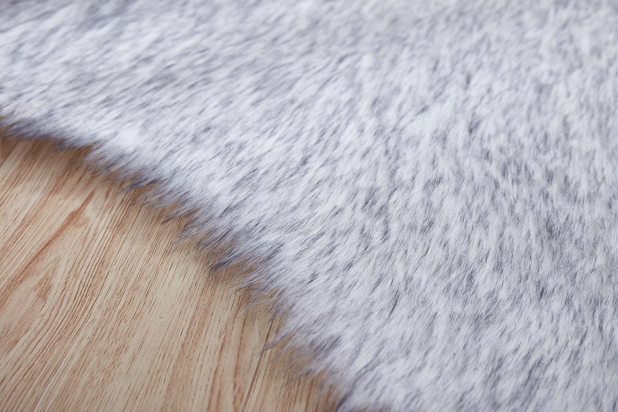 Luxury Dark Grey Faux Fur Decorative Rug measuring 32 inches by 71 inches, showcasing its plush texture and elegant design.