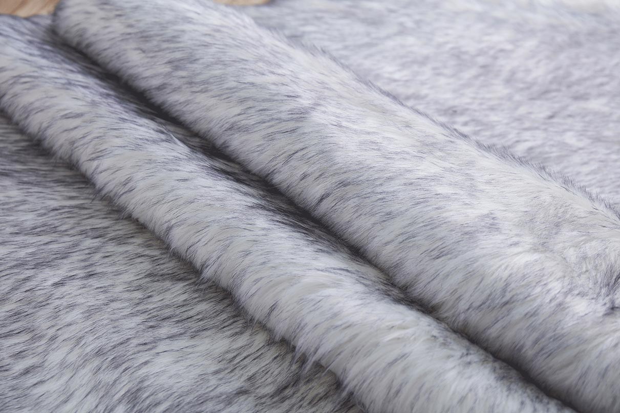 Luxury Dark Grey Faux Fur Decorative Rug measuring 32 inches by 71 inches, showcasing its plush texture and elegant design.