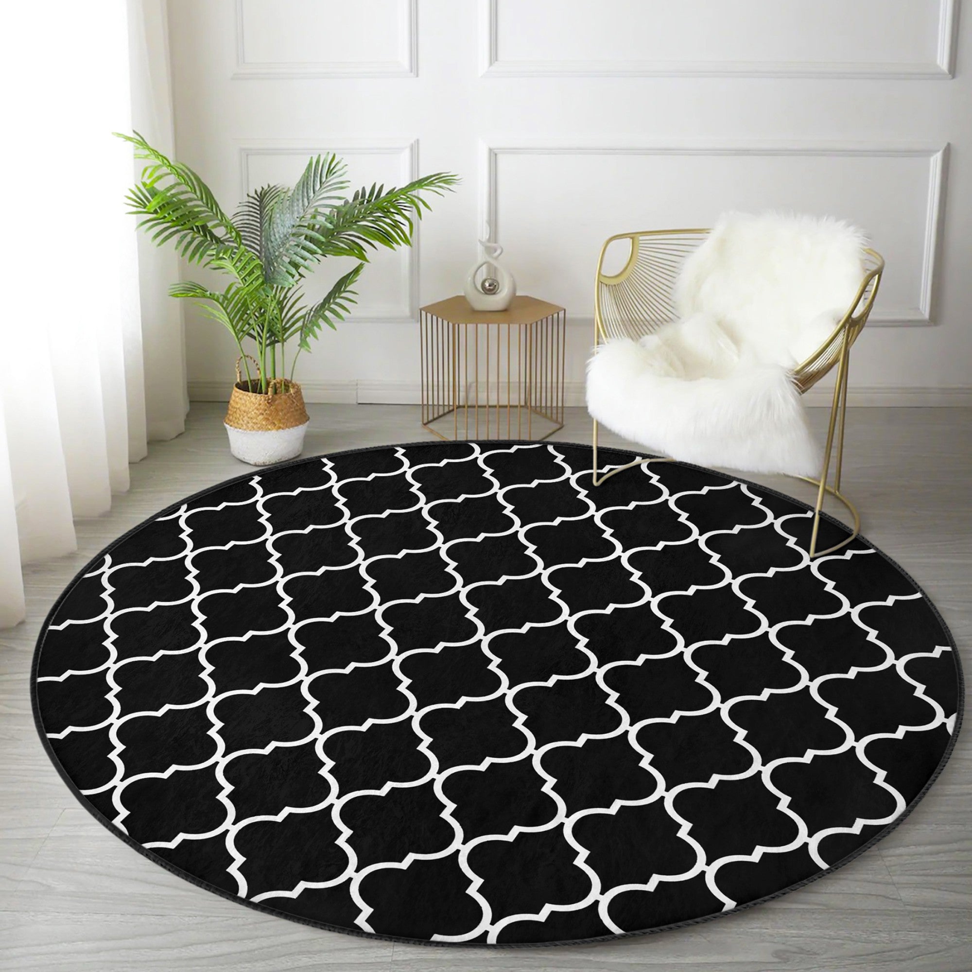 Luxury round rug in black and white design, showcasing a modern and elegant pattern, perfect for living room decor.