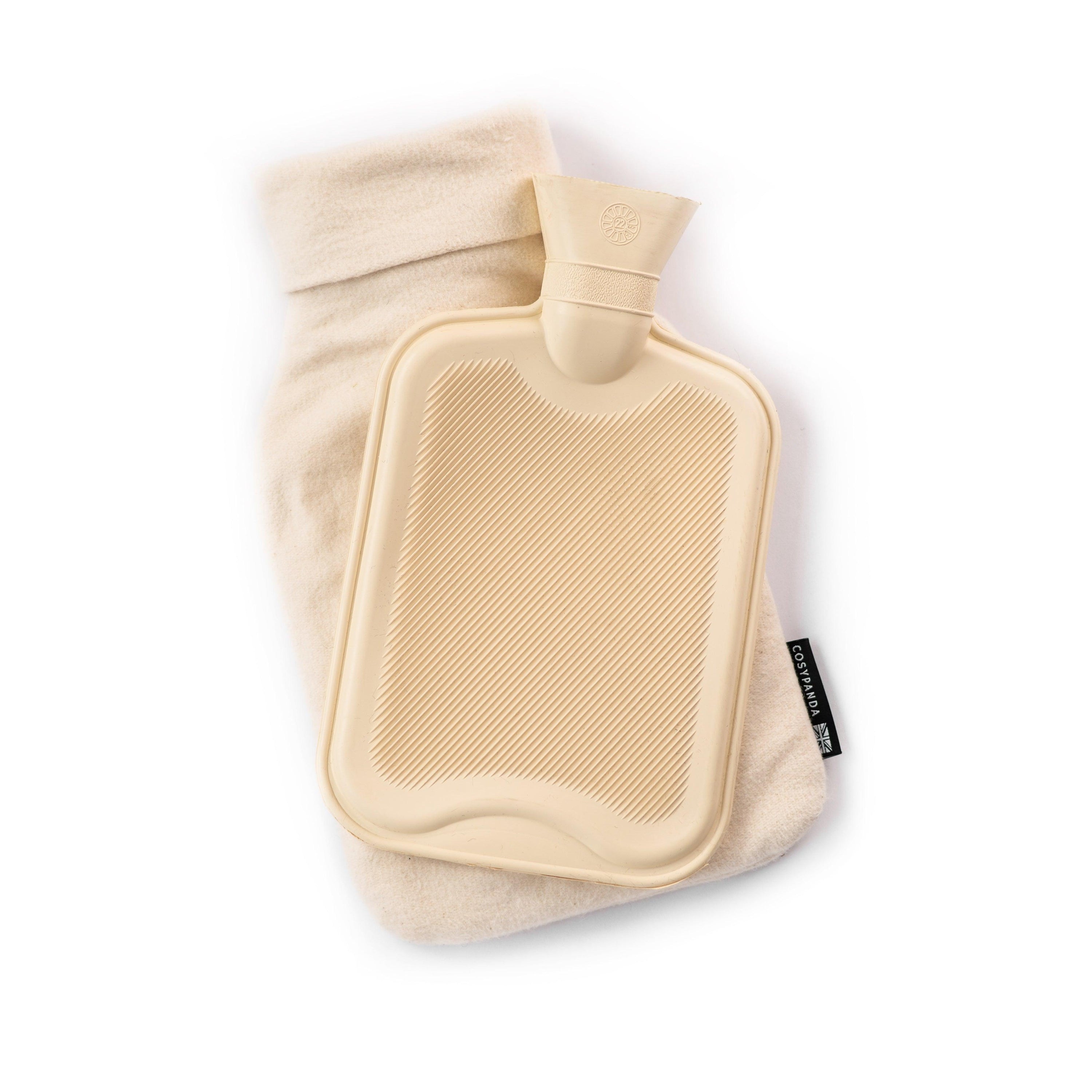 Luxury Natural Bamboo Hot Water Bottle with a handmade roll-neck cover, showcasing its eco-friendly materials and stylish design.