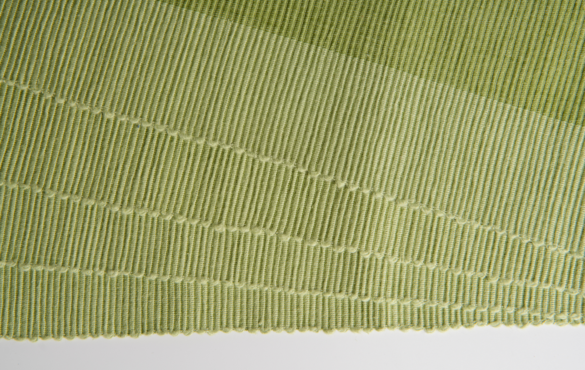 Luxury Green Placemats made from 100% organic cotton, showcasing a premium quality weave, perfect for elegant dining settings.